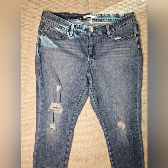 Levis Women's 711 Skinny Jean, Medium Wash, Mid Rise, Freyed Hem Size 33 - Picture 5 of 13